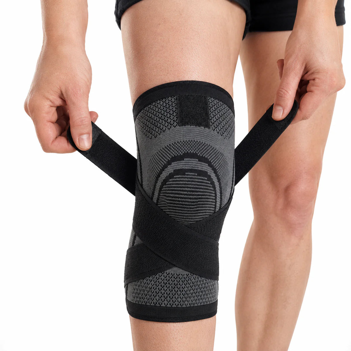 Kniebrace met compressie en verstelbare sluitband